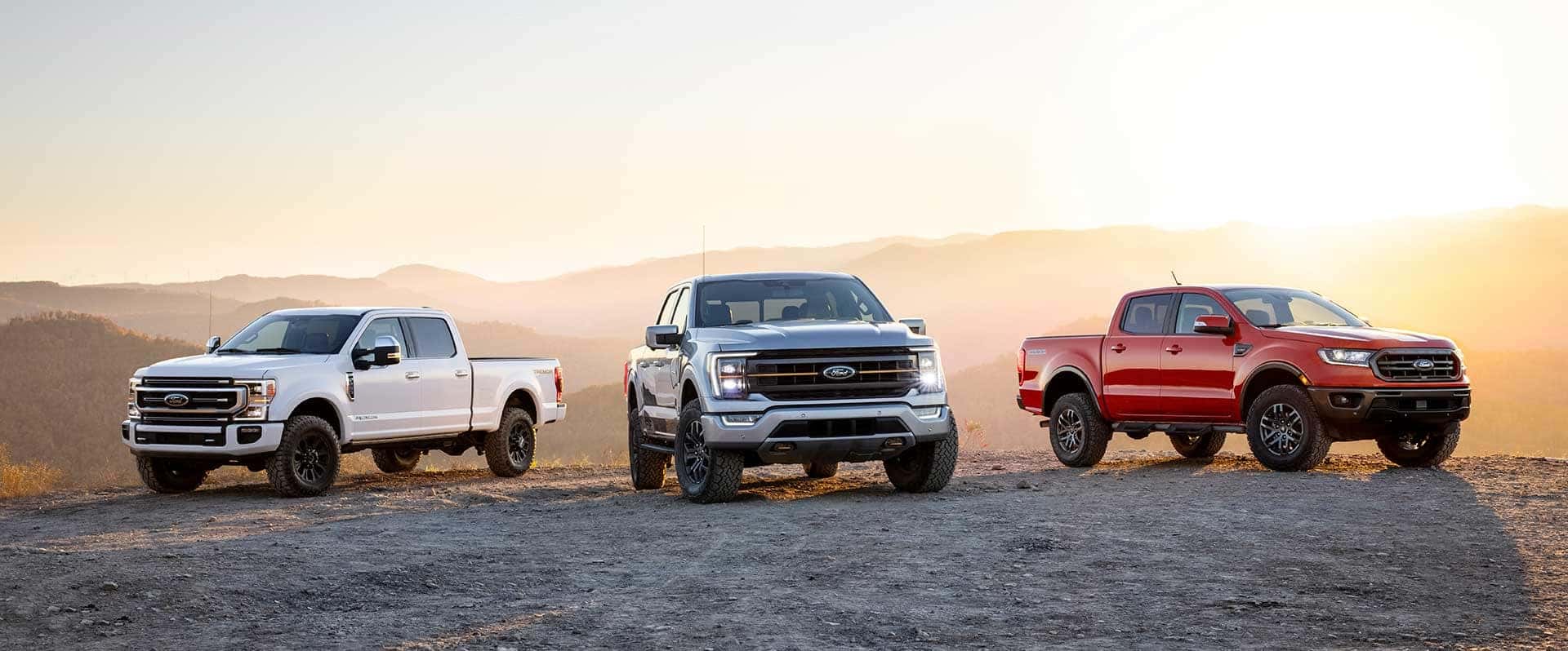 A Ford Bronco driving thru a dessert.