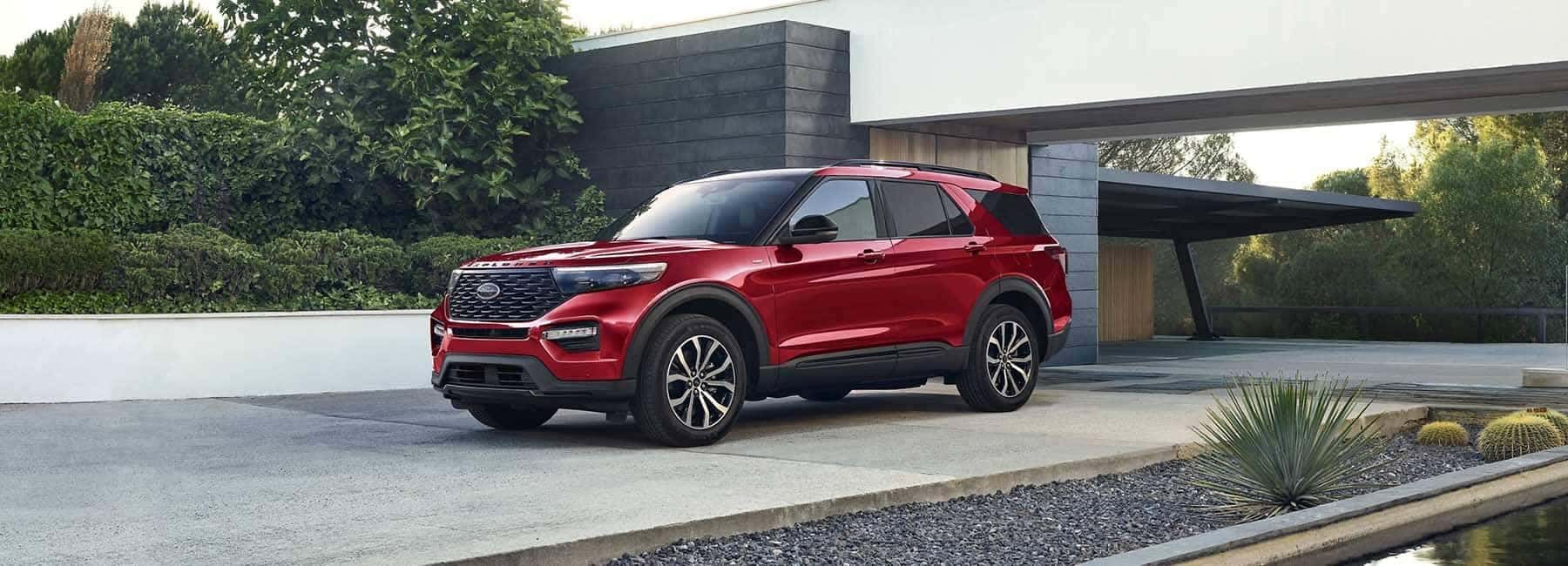 Ford Explorer parked next to building