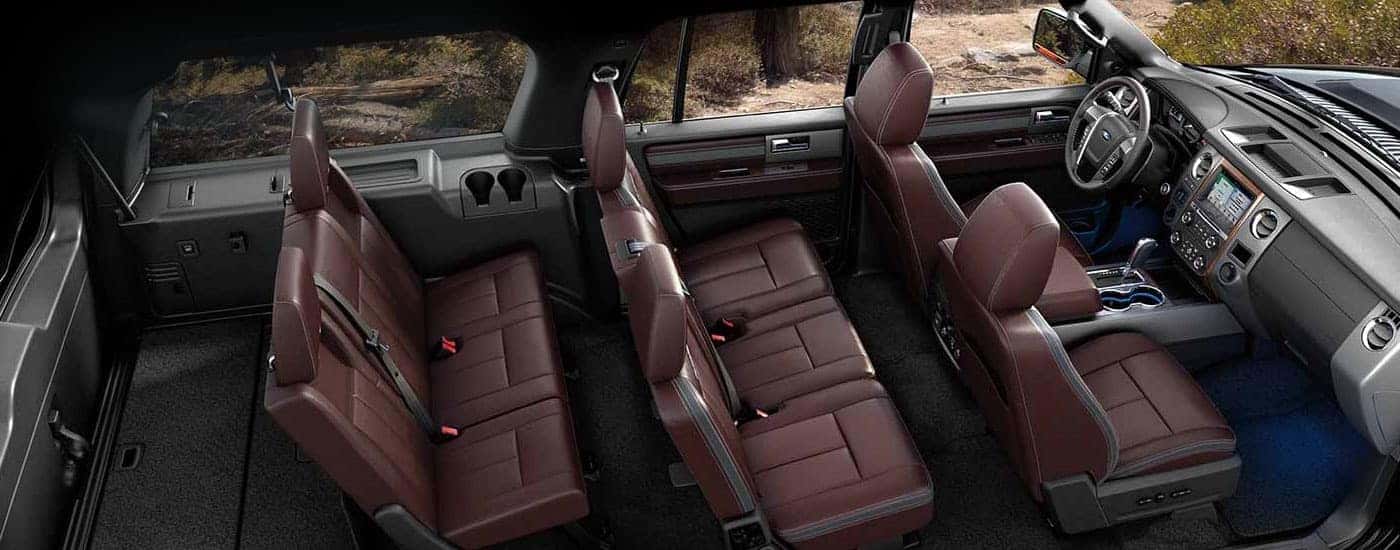 The maroon leather seating is shown in a 2016 Ford Expedition for sale.