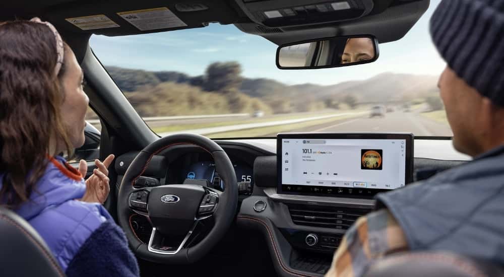 A person using the BlueCruise feature in a 2025 Ford Explorer for sale.