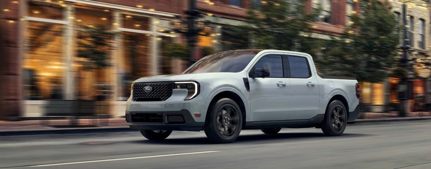 A grey 2025 Ford Maverick is shown from the side.