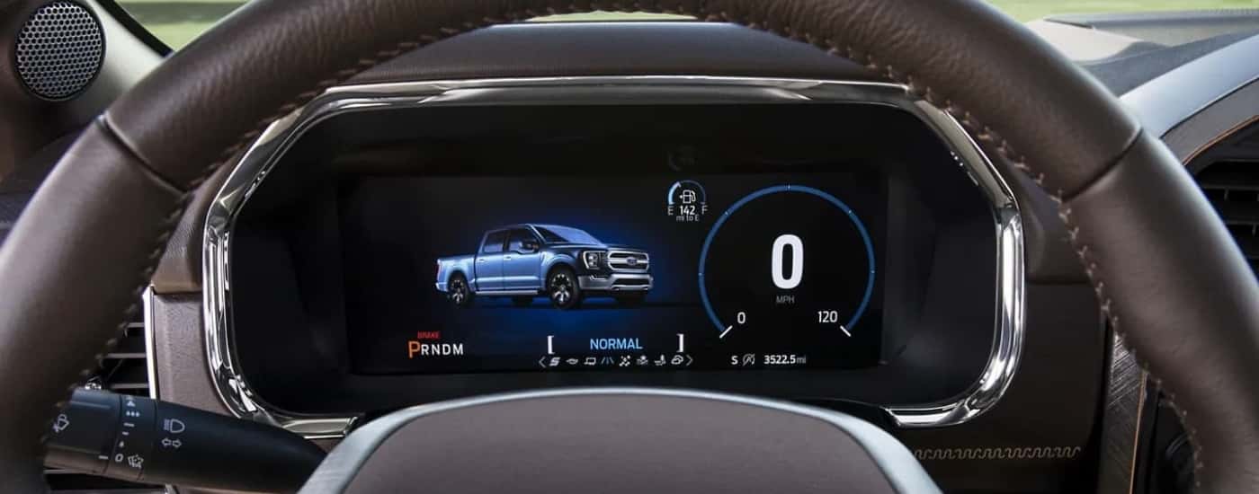 A digital gauge cluster is shown in a 2023 Ford F-150.