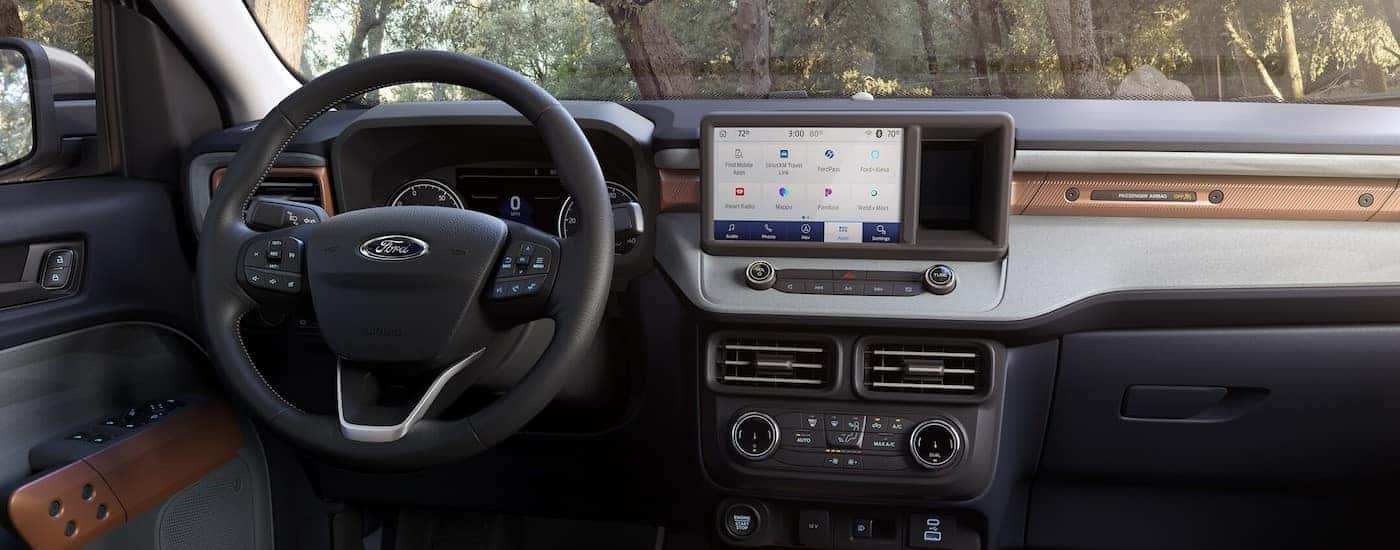 The black and brown dash in a 2025 Ford Maverick.
