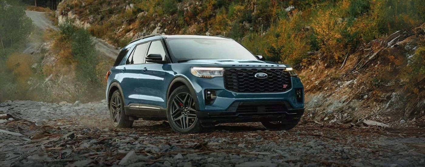 Blue 2025 Ford Explorer for Sale Near Fletcher parked off-road