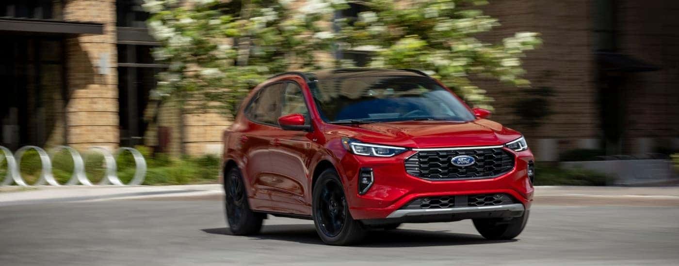 A red 2025 Ford Escape for sale near Candler from the front at an angle.