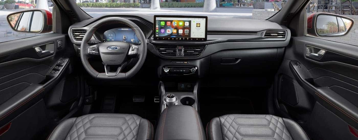 The black interior of a 2025 Ford Escape.