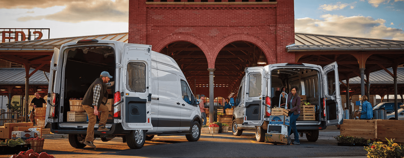 Two 2026 Ford Transits parked side by side