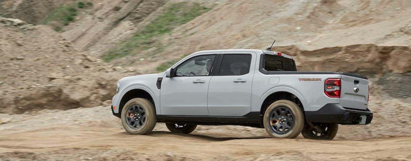 A grey 2023 Ford Maverick from the side.