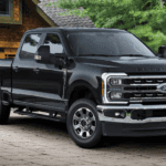 Black 2026 Ford F-250 Super Duty backed into a driveway