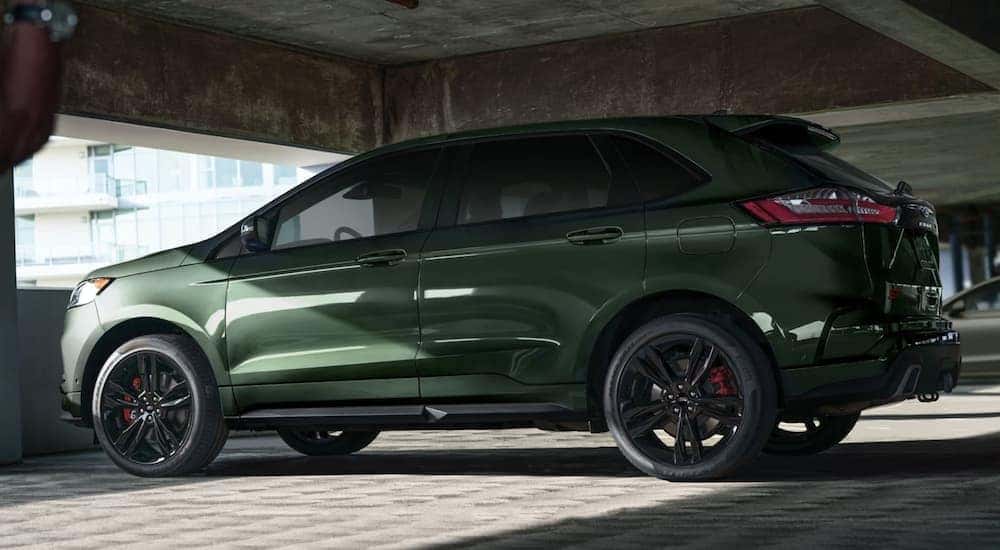 A green 2022 Ford Edge is parked in a parking garage.