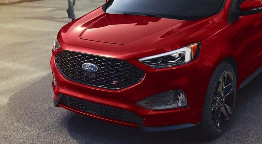 The front end of a red 2024 Ford Edge.
