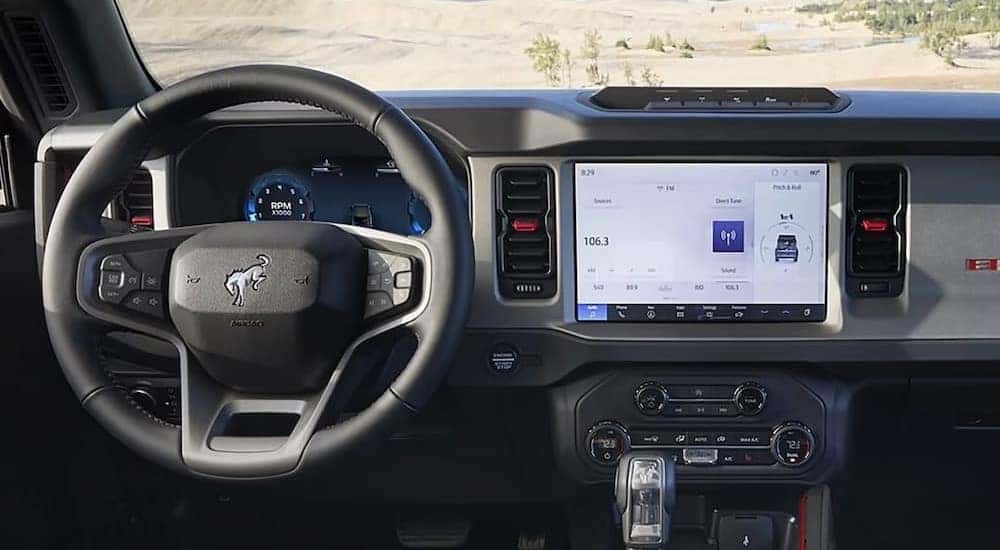 The gray dash in a 2025 Ford Bronco for sale in Saint Johns.