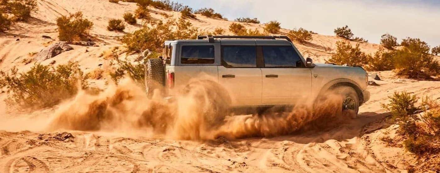 A silver 2025 Ford Bronco for sale in Saint Johns is shown.