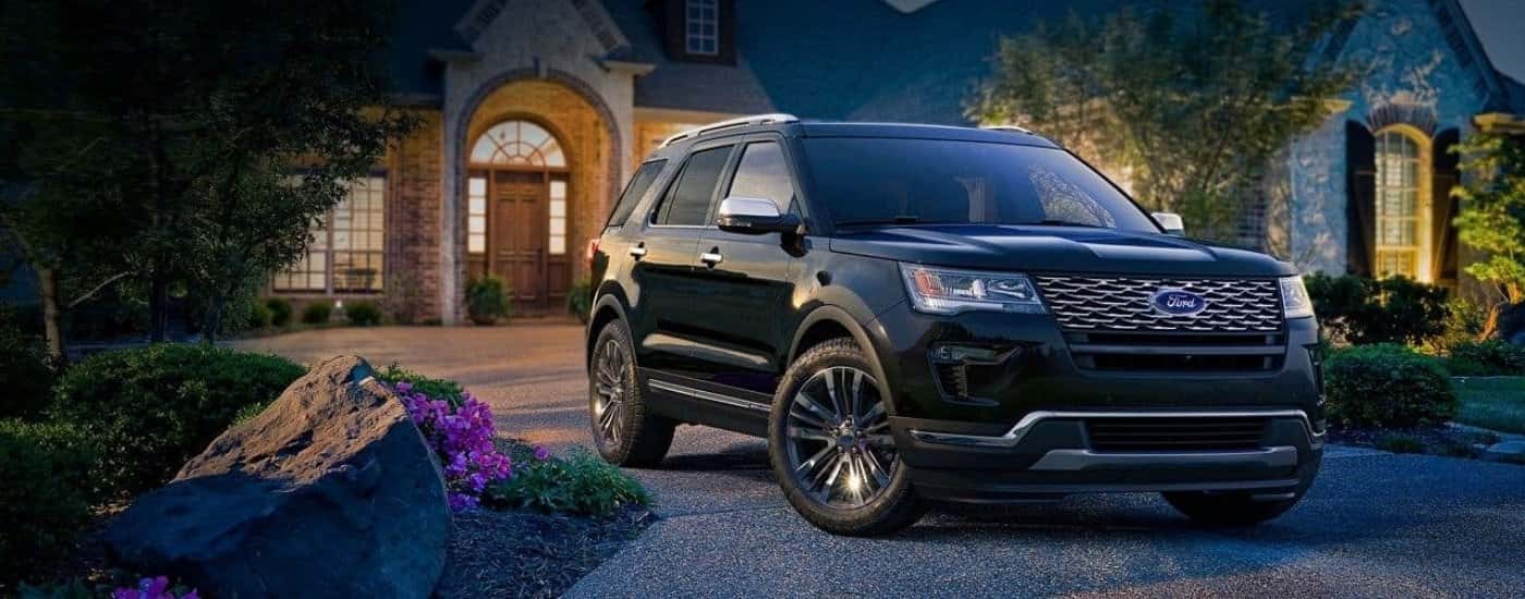 A black 2018 Ford Explorer for sale near Ionia parked on a driveway.
