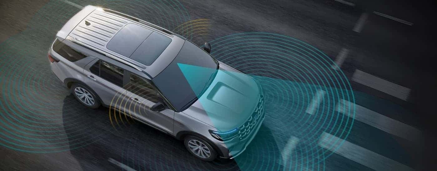 Simulated sensor lines from a silver 2025 Ford Explorer.