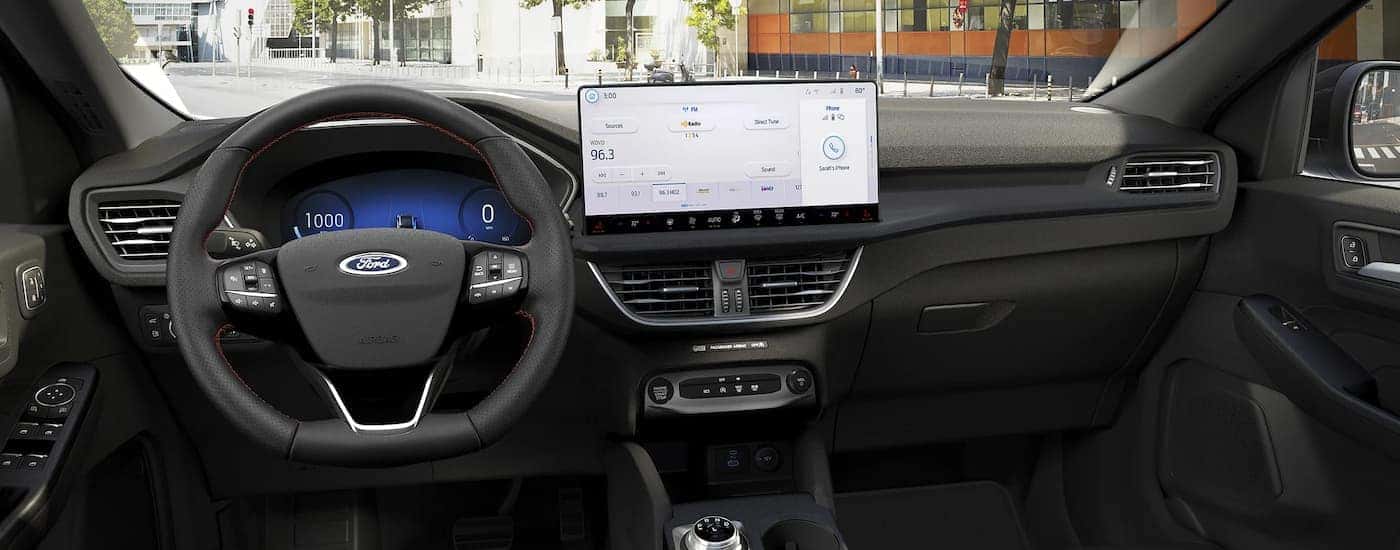 Infotainment and digital gauge cluster on a 2025 Ford Escape for sale near Ionia