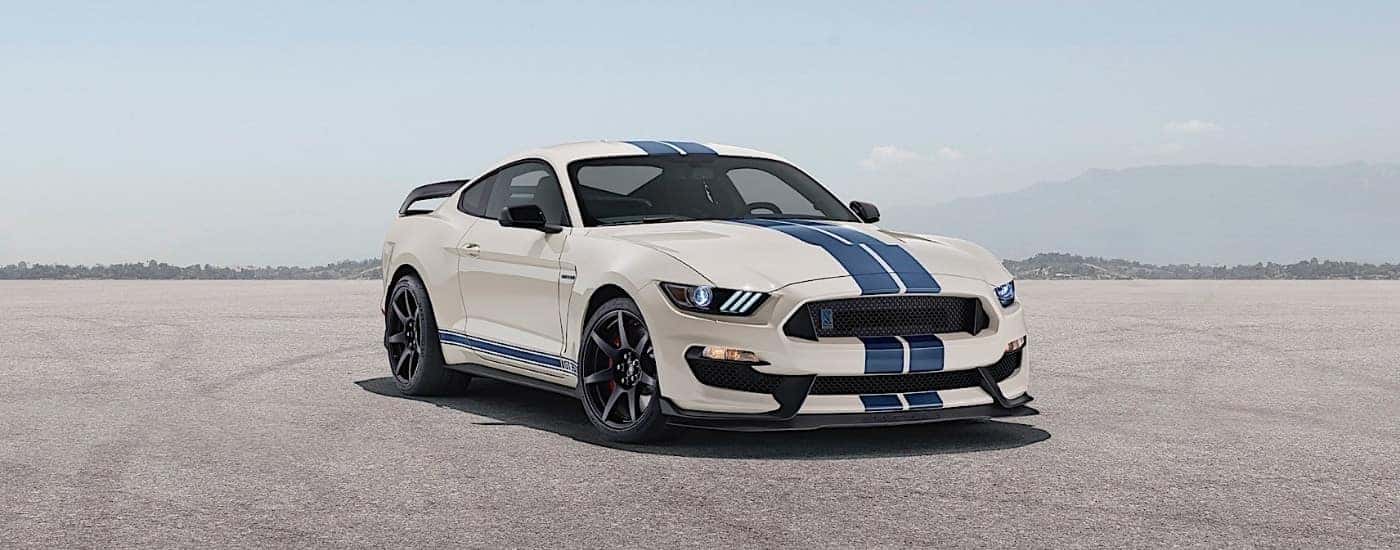 A white 2020 Ford Mustang GT350R Heritage parked on pavement.