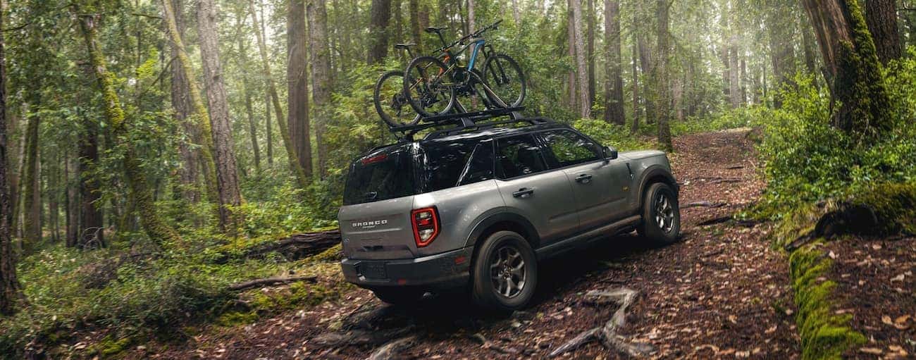A grey 2021 Ford Bronco Sport is driving to a used Ford dealership near Ionia.