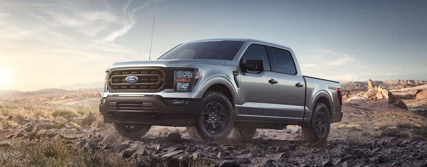 A silver 2023 Ford F-150 Rattler from the side.