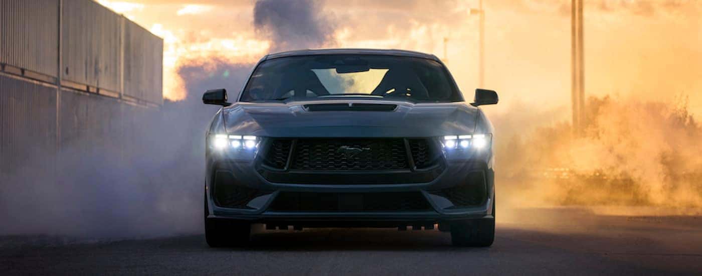 A grey 2024 Ford Mustang GT from the front.