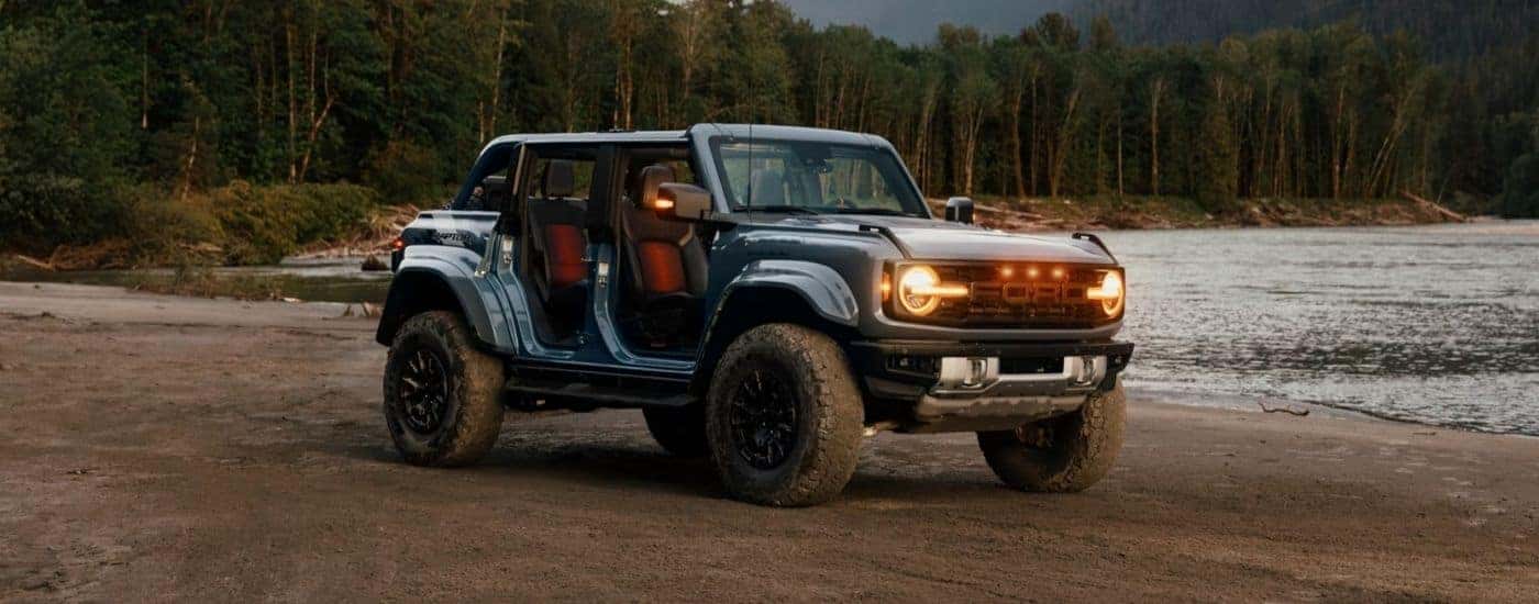 A grey 2025 Ford Bronco Raptor from the side.