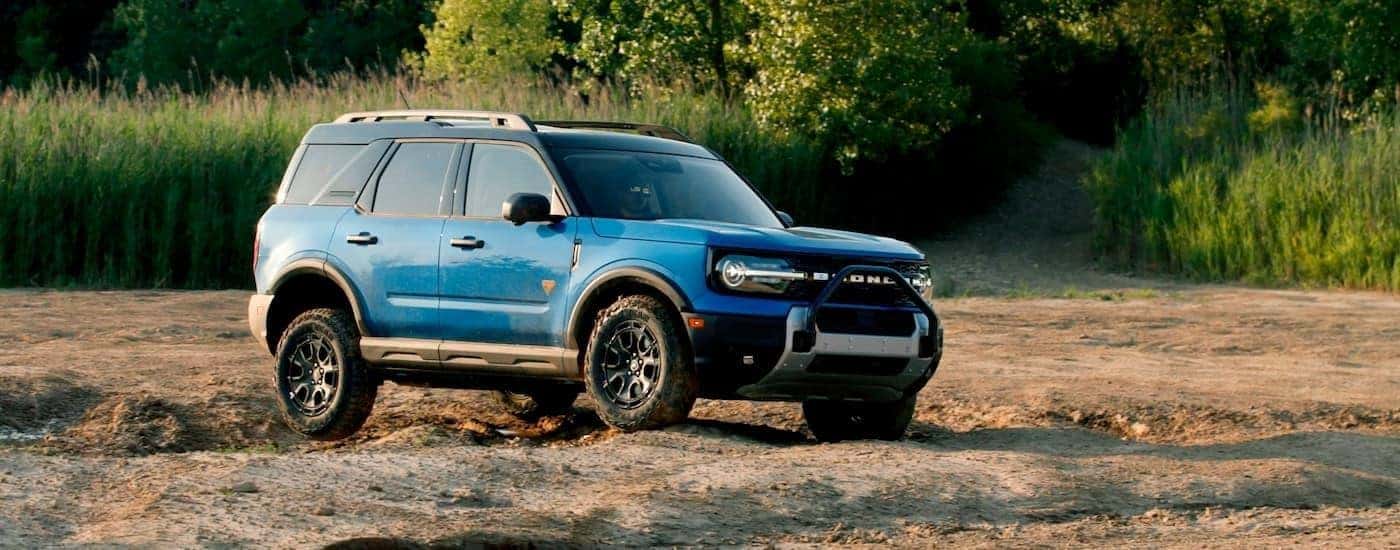 A blue 2025 Ford Bronco Sport from the side.