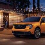 Orange 2026 Ford Maverick parked under string lights