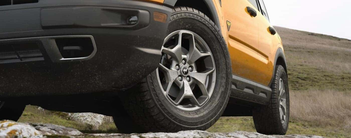 Wheel on a yellow 2024 Ford Bronco Sport Badlands