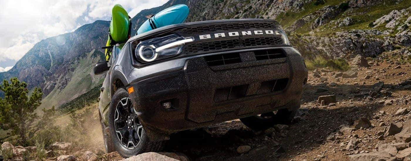Grey 2025 Ford Bronco Sport Outer Banks driving off-road