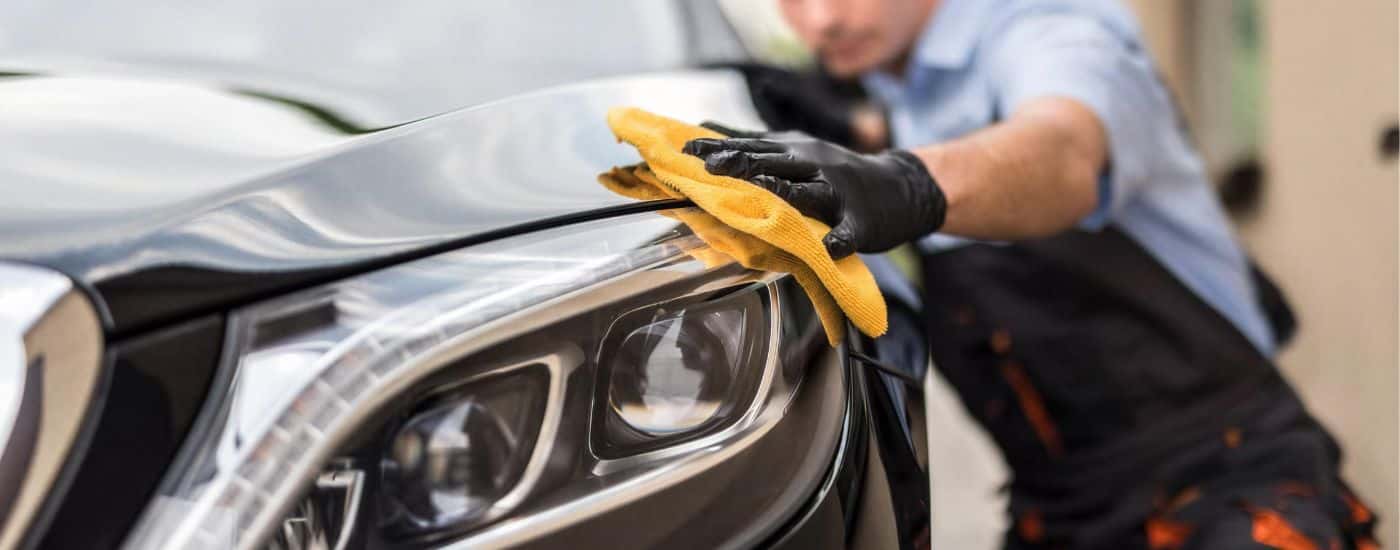 Maintenance being performed at a Ford Dealership.