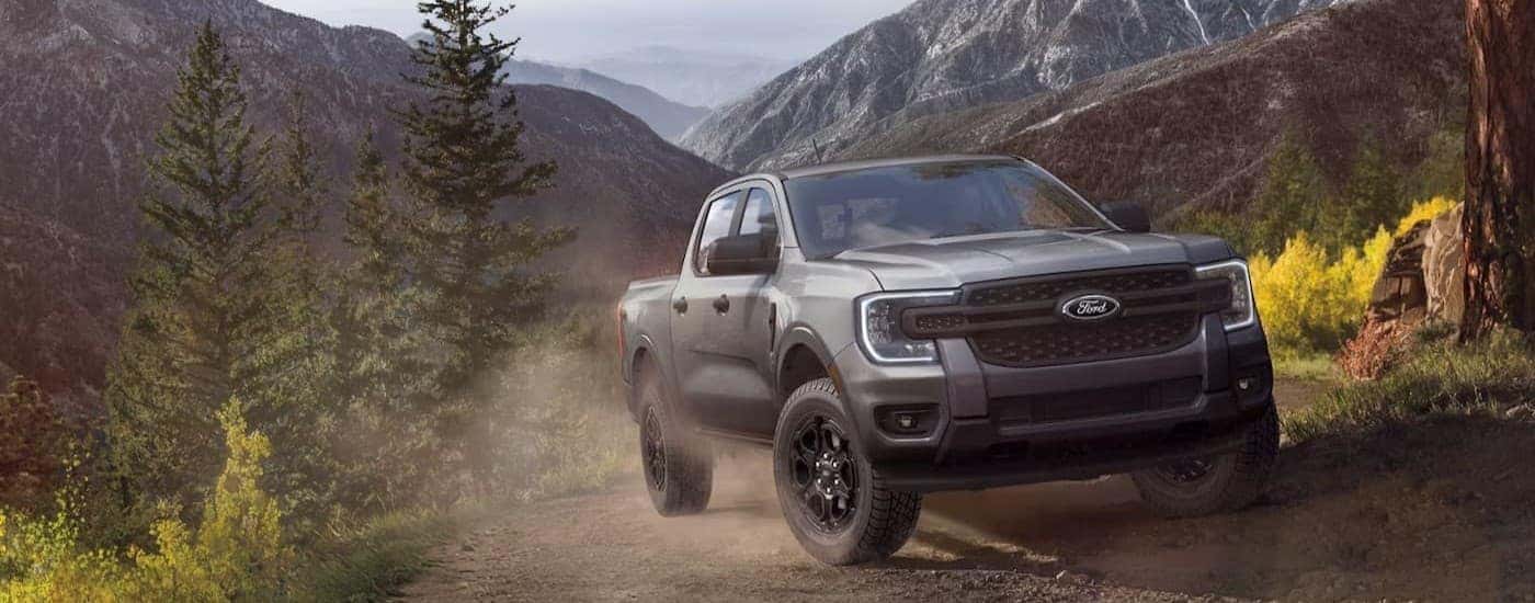 A silver 2026 Ford Ranger off-roading.
