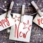 A Happy New Year sign is shown.