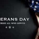 A flag is shown honoring all veterans who served.