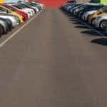 A used dealership lot is shown.