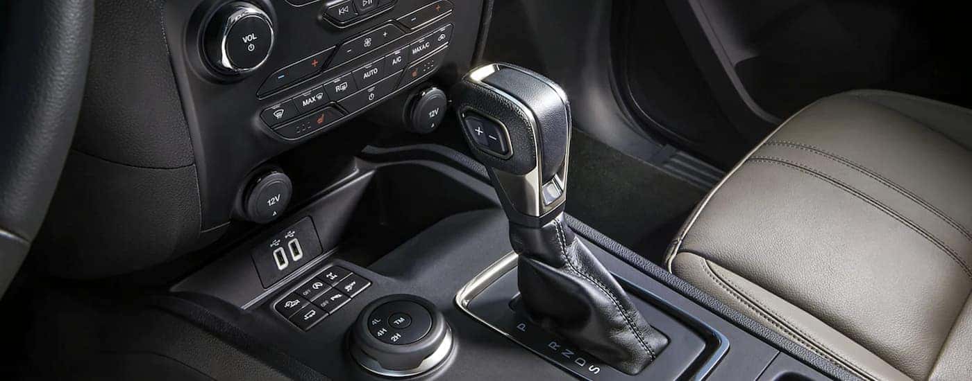 A close up of the center console is shown in a 2022 Ford Ranger Lariat.