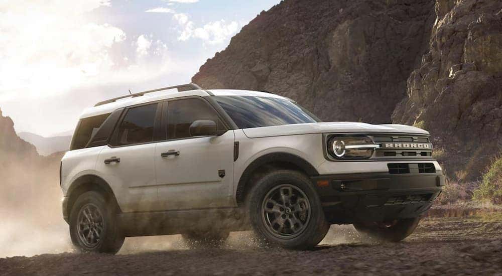 A silver 2022 Ford Bronco Sport Big Bend is shown from the side after leaving a dealer that has a Ford Bronco Sport for sale.