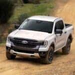 A white 2024 Ford Ranger XLT is shown from the front at an angle.
