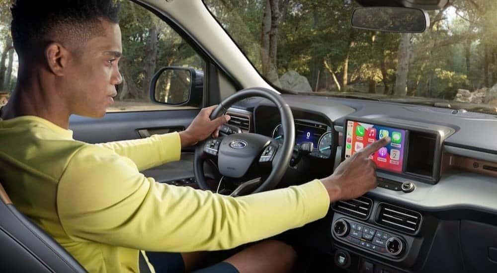 The black interior and dash in a 2024 Ford Maverick is shown.
