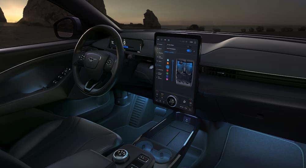 The blue ambient lighting in a 2024 Ford Mustang Mach-E for sale near Carmel.