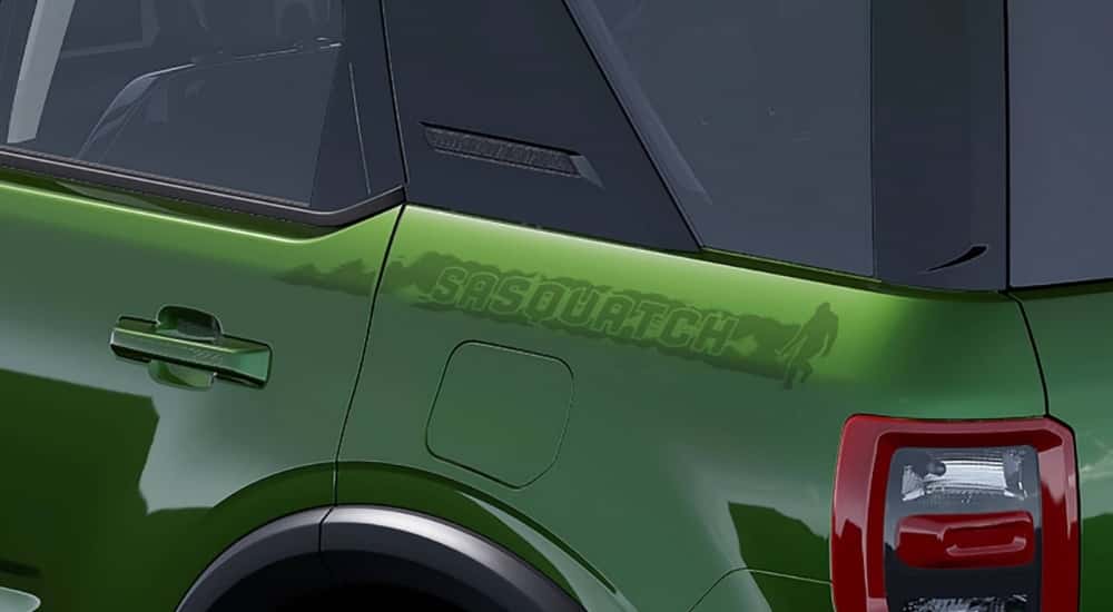The sasquatch decal is shown on a green 2025 Ford Bronco Sport Sasquatch.