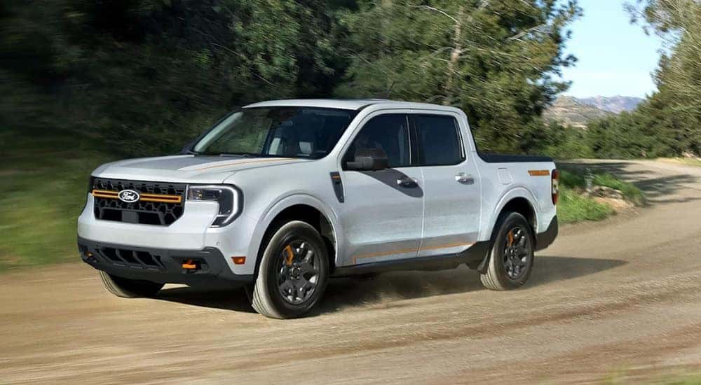 A white 2025 Ford Maverick Tremor driving on a trail.