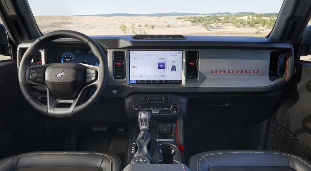 Dash and infotainment screen in a  2025 Ford Bronco Free Wheeling