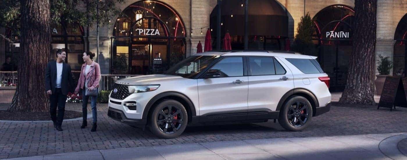Silver 2022 Ford Explorer parked on a city street