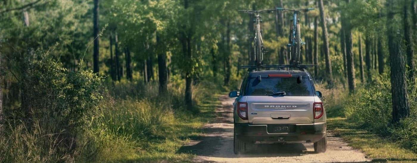 Silver 2023 Ford Bronco Sport driving down a trail