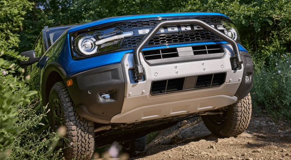 Blue 2026 Ford Bronco Sport coming out of the woods