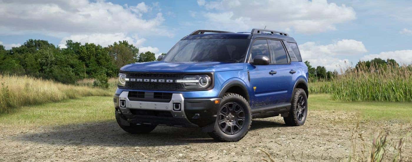 Blue 2026 Ford Bronco Sport parked in a field