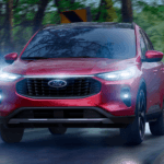 Ford Escape driving around a curve