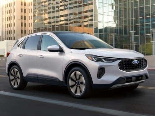 2025 Ford Escape driving through a city