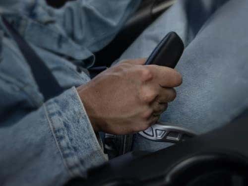 2025 Ford Mustang close up view of man holding drift brake handle