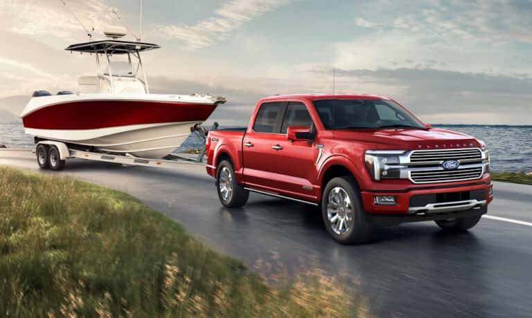 2026 Ford F-150 Exterior Towing A Boat By Lake